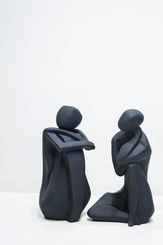 ABSTRACT TALKING COUPLE STATUE
