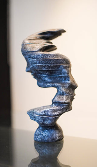 ABSTRACT DOUBLE  FACE STATUE