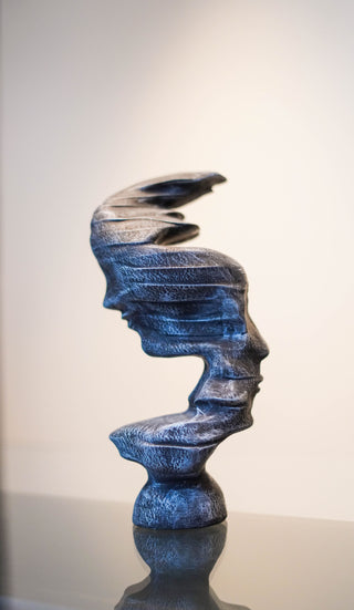 ABSTRACT DOUBLE  FACE STATUE