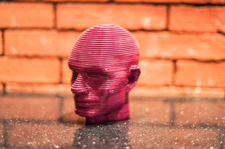 ABSTRACT MUTLILAYERED FACE  STATUE
