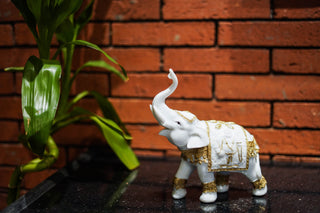 CARVED ELEPHANT WITH TRUNK UP  STATUE