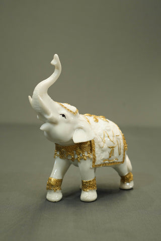 CARVED ELEPHANT WITH TRUNK UP  STATUE