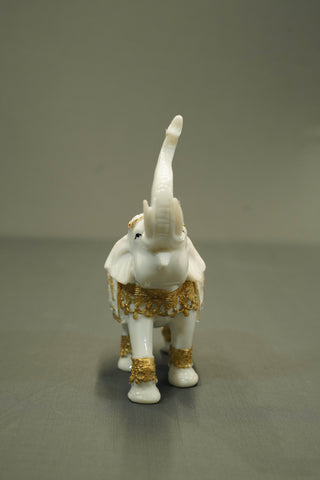 CARVED ELEPHANT WITH TRUNK UP  STATUE